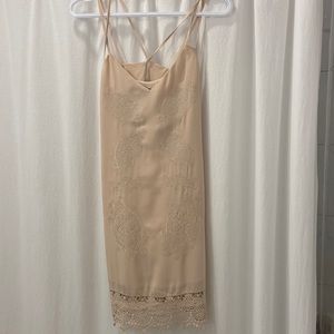 Light pink/beige dress with crochet at bottom